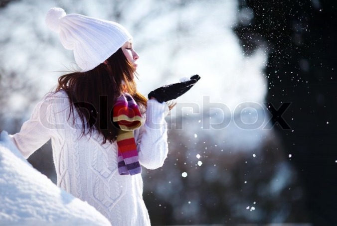 3449318-girl-playing-with-snow-in-park.jpg